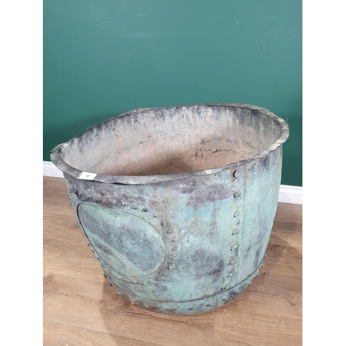 13 - An antique rivetted metal Cauldron A/F 2ft 6in D x 1ft 10in H (R3)