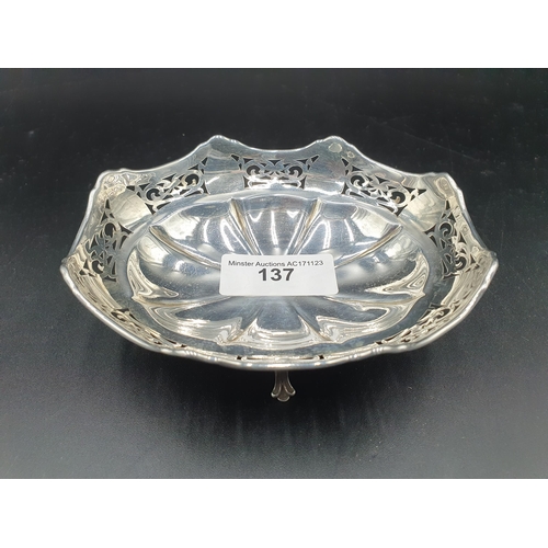 137 - A George V silver pierced oval Bon Bon Dish on four shaped feet, Birmingham 1923