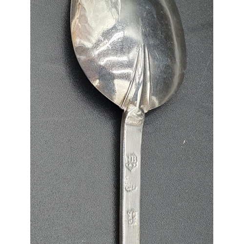 142 - A 17th Century silver Trefid Spoon with punched initials G.H, rat tail bowl, maker's mark N.B over m... 