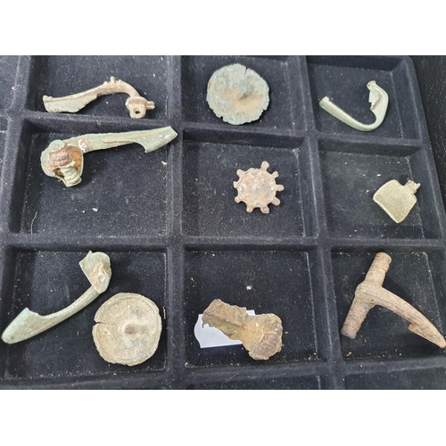 274 - A Collection of mainly Roman Artefacts including Fibula Brooches, an enamel Disc Brooch, and fragmen... 