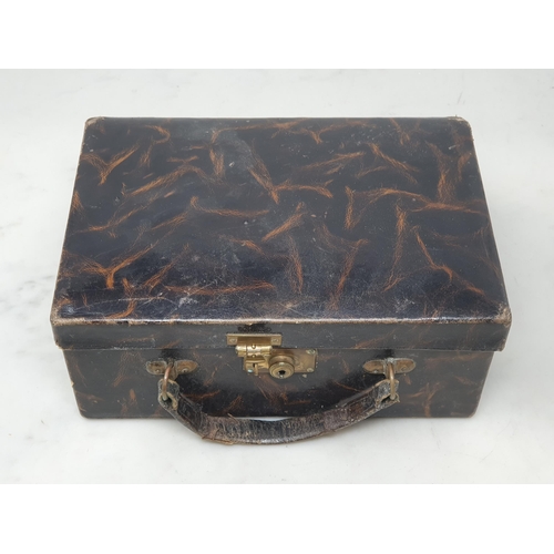 39 - A leather travelling Vanity Case with fitted interior and mirror within lid 8 1/2in W x 3 1/2in H