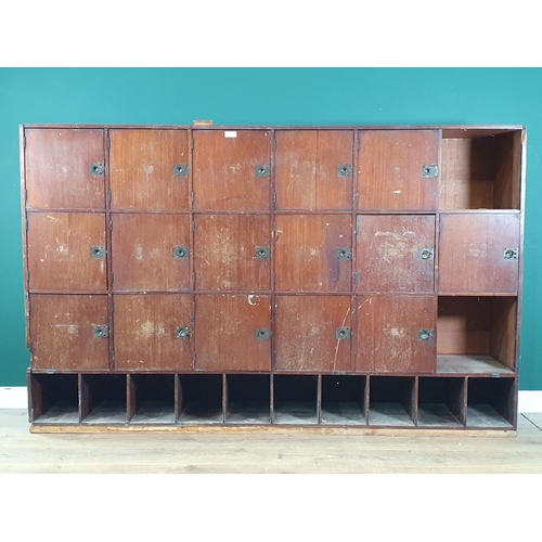 5 - A bank of lockers with inset brass handles above pigeonholes, 6ft 6in W x 4ft 1in H, (R6)