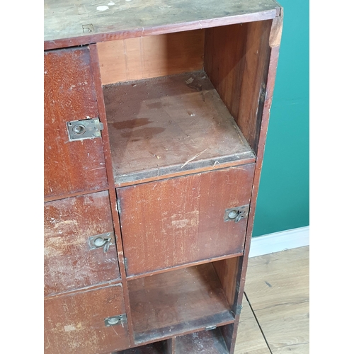 5 - A bank of lockers with inset brass handles above pigeonholes, 6ft 6in W x 4ft 1in H, (R6)