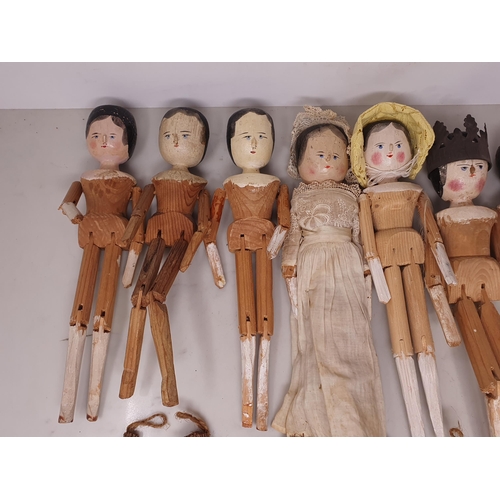 545 - Eight wooden Peg Dolls (some A/F) and six herb bouquets