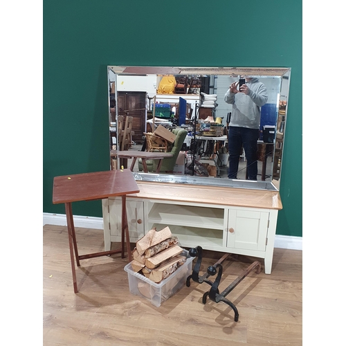 611 - A wooden and painted TV Stand, a pair of wrought iron andirons, a folding Table and a Wall Mirror, (... 