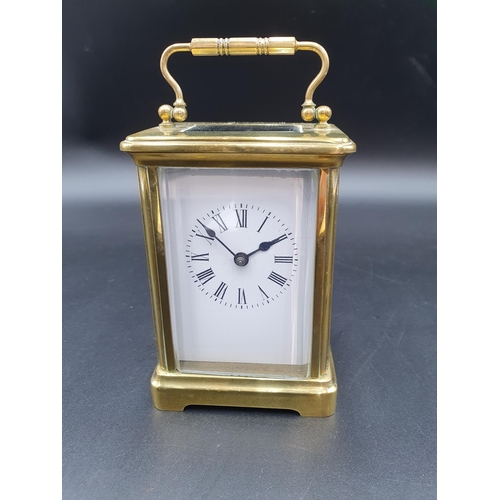 65 - A French brass cased Carriage Clock with lever escapement , No 6075,  5 1/2in (R1)
