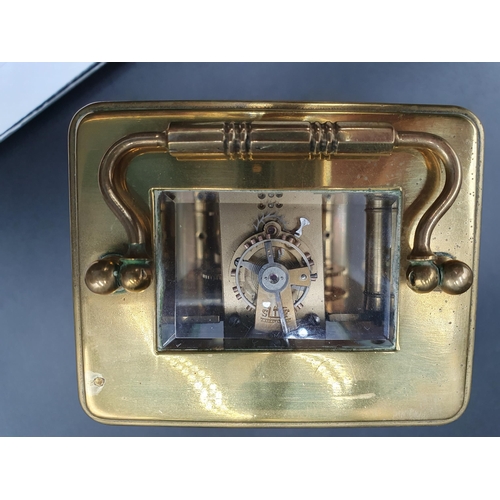 65 - A French brass cased Carriage Clock with lever escapement , No 6075,  5 1/2in (R1)