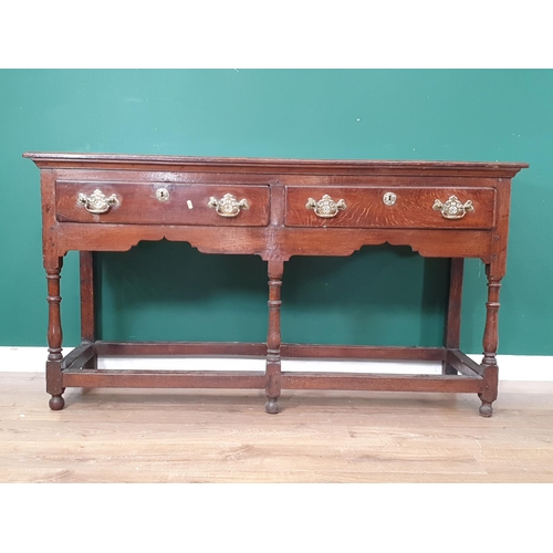 659 - An 18th Century oak Dresser Base, fitted two frieze drawers on baluster turned supports and squared ... 