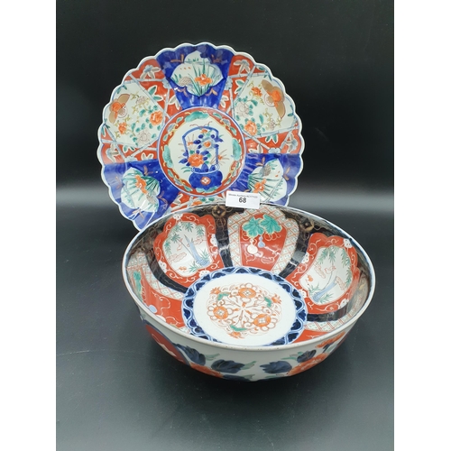 68 - An Imari Bowl and Charger painted birds and flowering shrubs in iron red, blue and gilt, Bowl 9 1/2 ... 