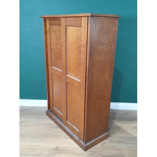 A Small Oak Cupboard With Sliding Doors Enclosing Shelves On Plinth   1100756886 PREVIEW.JPG