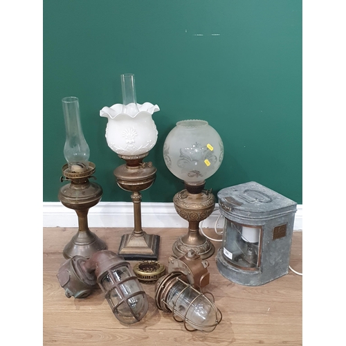 699 - A Seahorse 43058 Ships Lantern converted to electric A/F, three assorted Oil lamps, a brass Ships Li... 