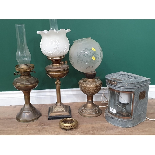 699 - A Seahorse 43058 Ships Lantern converted to electric A/F, three assorted Oil lamps, a brass Ships Li... 