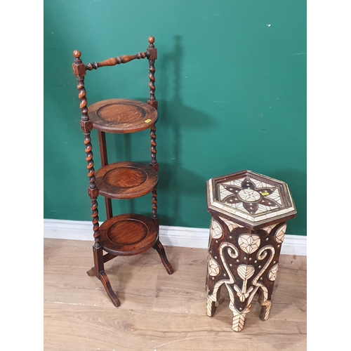 700 - An Eastern hexagonal Occasional Table with brass studded and metal inlay and an oak three tier Cake ... 