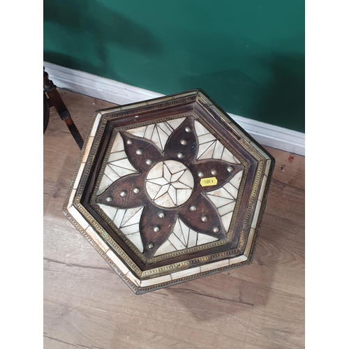 700 - An Eastern hexagonal Occasional Table with brass studded and metal inlay and an oak three tier Cake ... 