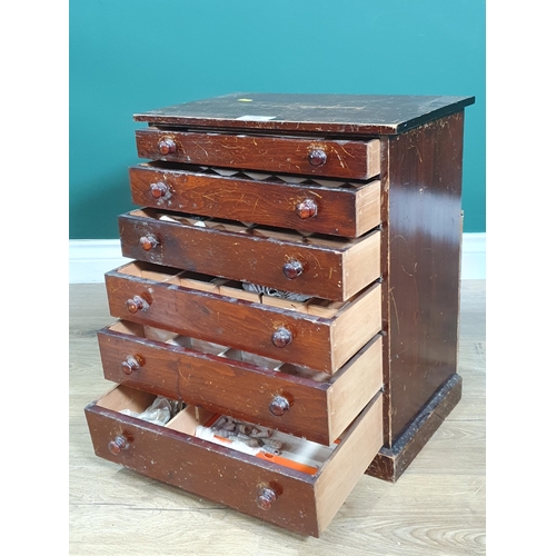 706 - A stained wood Table Top Collector's Chest with multiple drawers containing shells, rocks, etc, 18in... 