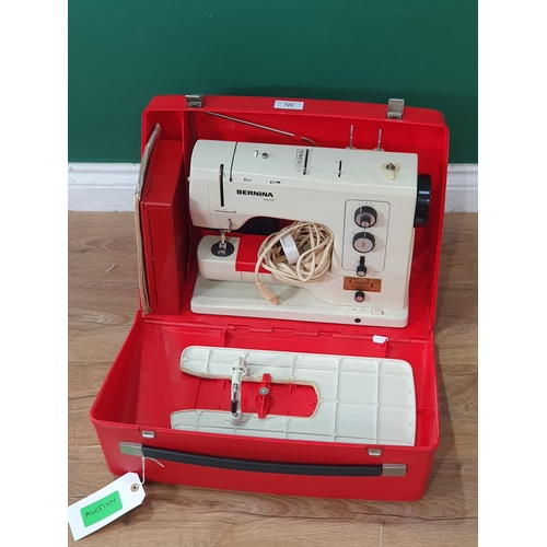 A cased "Bernina Record" Sewing Machine and Manual. (R9). (Passed PAT)