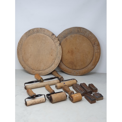 79 - Two wooden Breadboards, five printing ink Rollers and five Printing Blocks depicting tools