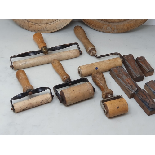 79 - Two wooden Breadboards, five printing ink Rollers and five Printing Blocks depicting tools