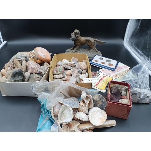82 - A quantity of Shells, Minerals and Fossils, spelter Retriever with pheasant, A/F Coins and Bank Note... 