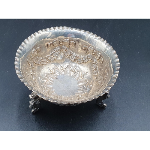 92 - A Victorian silver circular Sugar Bowl with ribbon and swag embossing on mask and scroll support, Lo... 