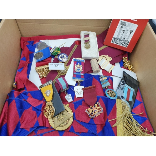 95 - A quantity of Masonic Regalia including Apron, two silver and enamel Medallions, and numerous others... 