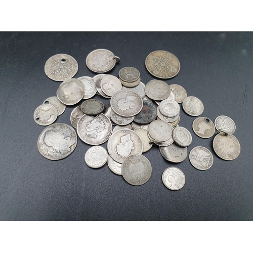 98 - A quantity of British silver Coins to include a Charles II Shilling (date worn) Queen Anne Sixpence ... 