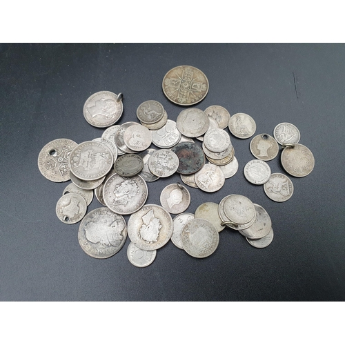 98 - A quantity of British silver Coins to include a Charles II Shilling (date worn) Queen Anne Sixpence ... 