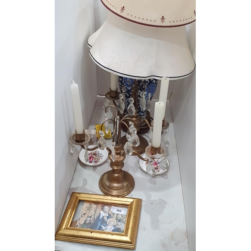 398 - A modern oriental Table Lamp, two Candle Sconces, and a framed Religious Print. (R5).