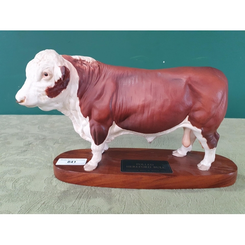 841 - A Connoisseur model by Beswick of a polled Hereford Bull on wooden plinth, 11in