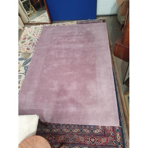 835 - A Dunelm mauve Rug, 9ft 6in x 6ft 7in (R11)