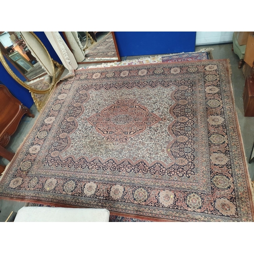 837 - A Tabris Carpet with multiple borders and with central lozenge and all-over floral motifs 11ft x 9ft... 