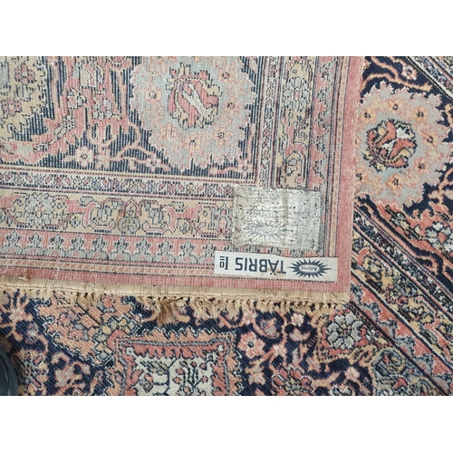 837 - A Tabris Carpet with multiple borders and with central lozenge and all-over floral motifs 11ft x 9ft... 