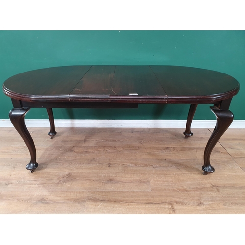 839 - A small 1920's stained wood extending Dining Table with rounded rectangular top on cabriole supports... 