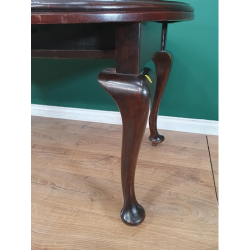 839 - A small 1920's stained wood extending Dining Table with rounded rectangular top on cabriole supports... 