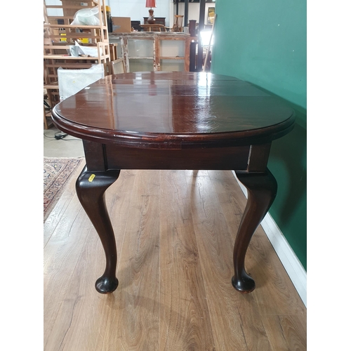 839 - A small 1920's stained wood extending Dining Table with rounded rectangular top on cabriole supports... 