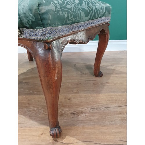 704 - A 19th Century Footstool with green upholstery mounted on cabriole supports 2ft W x 1ft 4in H (R8)