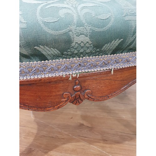 704 - A 19th Century Footstool with green upholstery mounted on cabriole supports 2ft W x 1ft 4in H (R8)