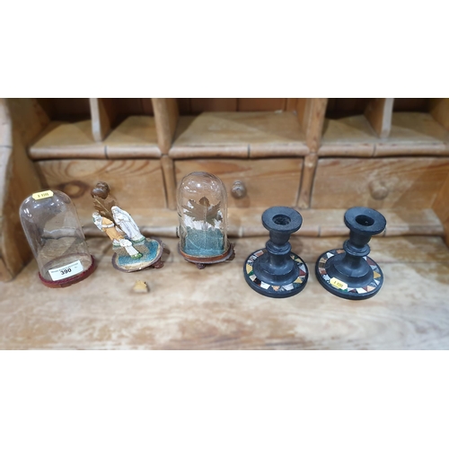 390 - A pair of resin painted religious groups under glass domes, 7in H, A/F, and a pair of black marble a... 