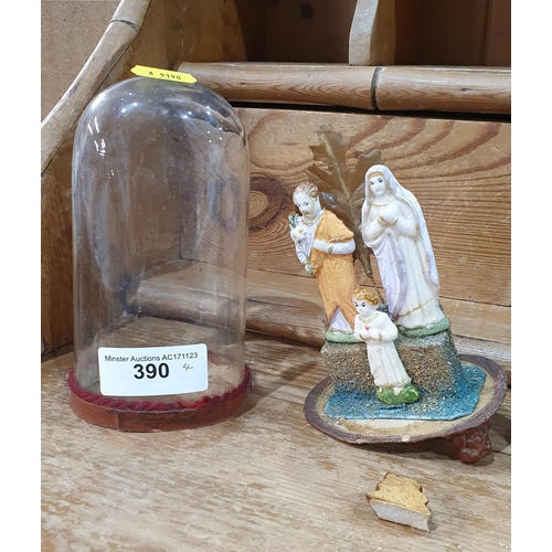 390 - A pair of resin painted religious groups under glass domes, 7in H, A/F, and a pair of black marble a... 