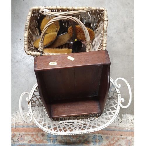 707 - A wicker Basket containing horn Beaker, horn Dressing Table Set, Purse, a white painted metal Basket... 