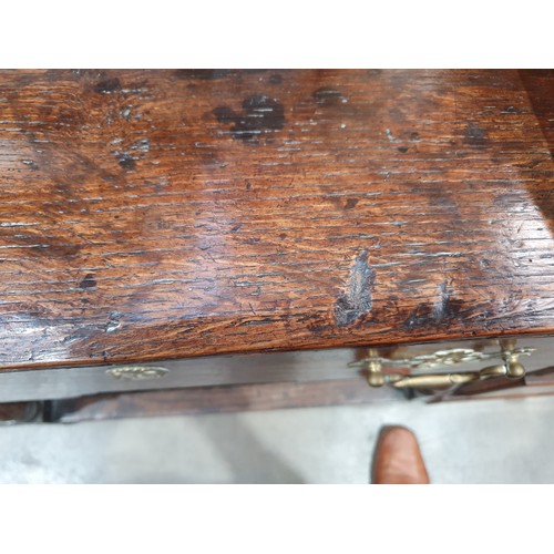 659 - An 18th Century oak Dresser Base, fitted two frieze drawers on baluster turned supports and squared ... 