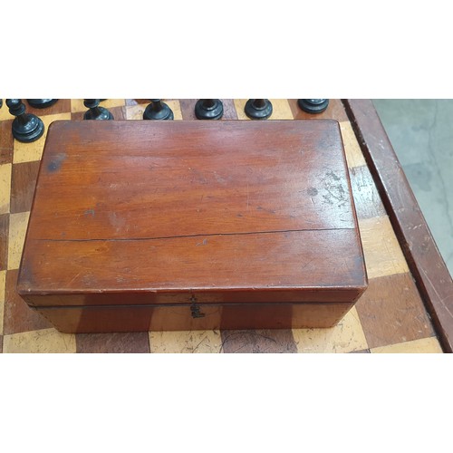 8 - A Boxwood weighted & matched Chess Set, Board and Box, one white Rook and one black rook marked with... 