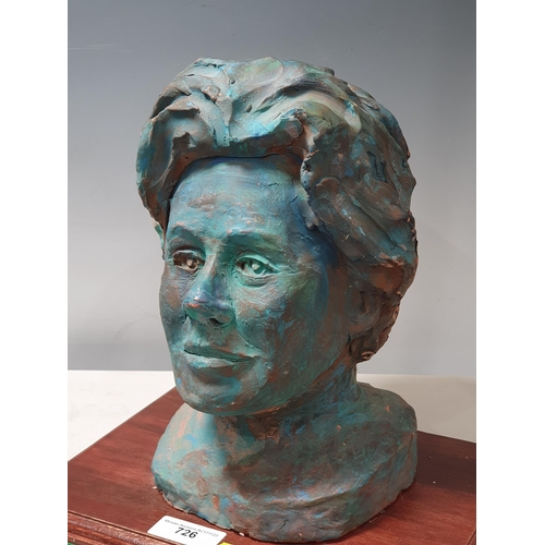 504 - A painted Bust of a Lady mounted on rectangular wooden plinth, 1ft High x 1ft Wide including the pli... 