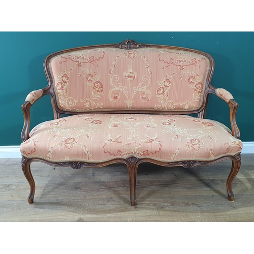 625 - A walnut framed French style three piece Suite having carved floral design top rails with pink flora... 