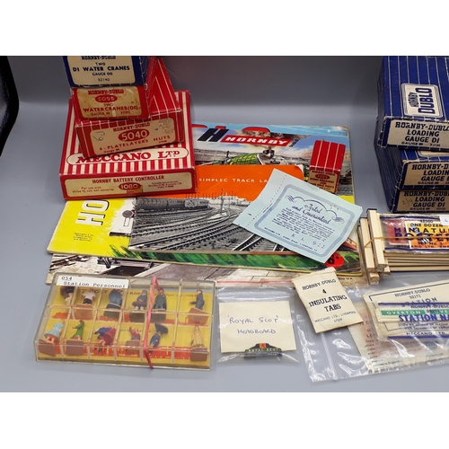 1031 - Quantity of Hornby Dublo accessories and literature comprising three boxes of Water Cranes, box 5040... 