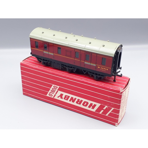 1044 - Hornby Dublo 4076 Six-wheeled Passenger Brake, unused boxed. Model in mint condition, box superb wit... 