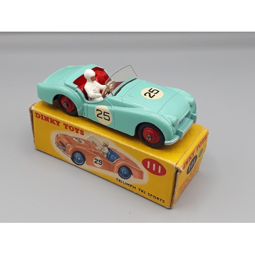 1074 - A boxed Dinky Toys No.111 turquoise Triumph TR2 Sports, Nr M-M, box VG-E