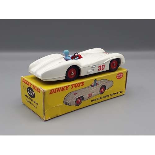 1075 - A boxed Dinky Toys No.237 Mercedes Benz Racing Car with plastic hubs, Nr M-M, box VG