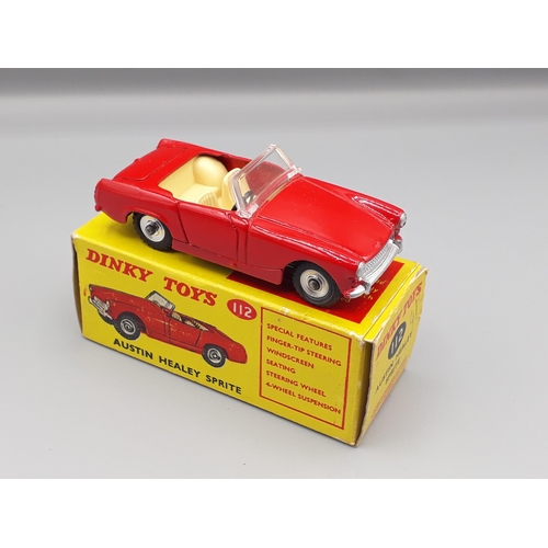 1076 - A boxed Dinky Toys No.112 Austin Healey Sprite, Nr M-M, box with packing ring VG-E