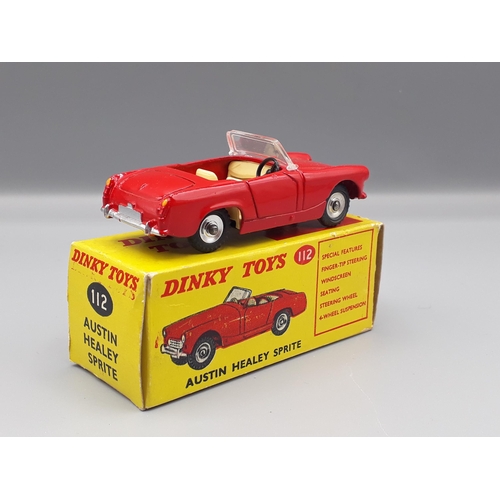 1076 - A boxed Dinky Toys No.112 Austin Healey Sprite, Nr M-M, box with packing ring VG-E